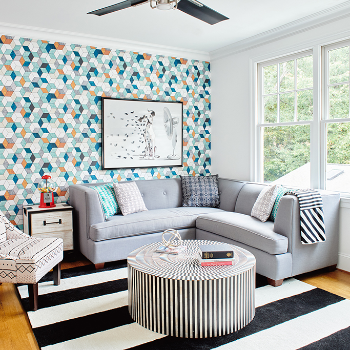 Den / family room with geometric wallpaper and strong black and white stripes